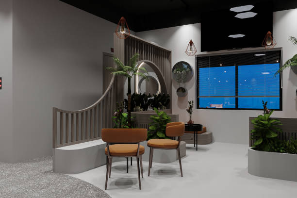 i17 The seating corner inteior with yellow loft chairs with a person table and botany background