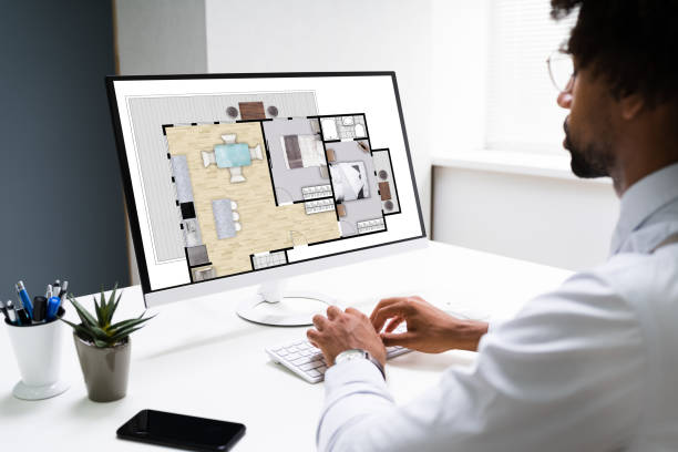 African American Home Assessor Man Using Computer