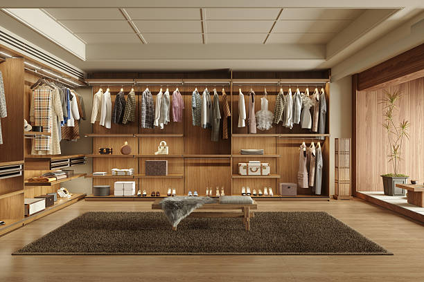 Modern Japandi Walk-in Closet with Wooden Wardrobes and Elegant Lighting
